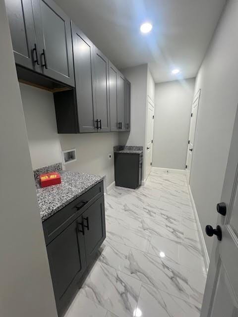 26433 W 144th Ter, Olathe, KS 66061 - washroom with cabinet space, hookup for a washing machine, recessed lighting, and light marble finish flooring