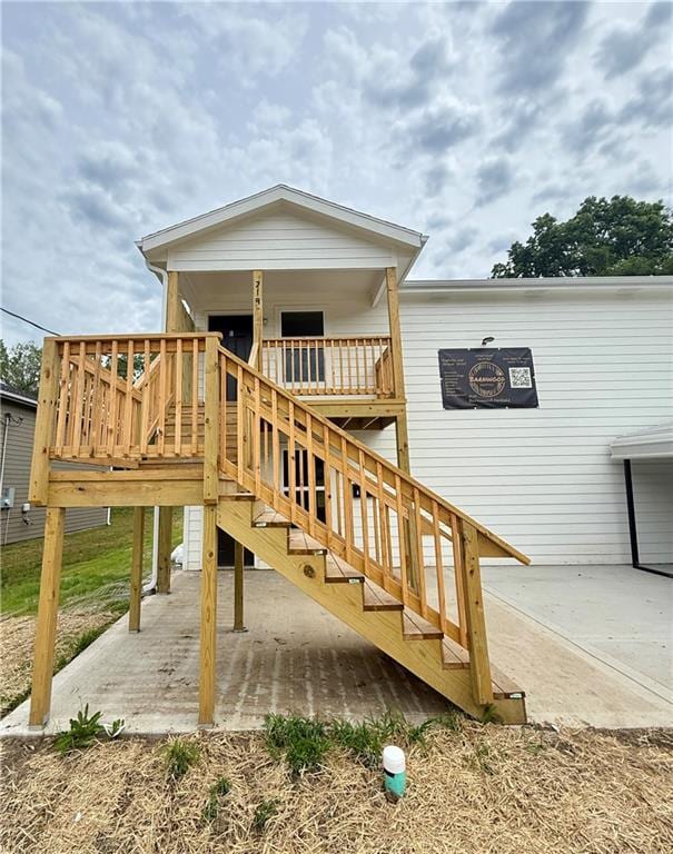 719 E Culton St, Warrensburg, MO 64093 - rear view of house with a patio