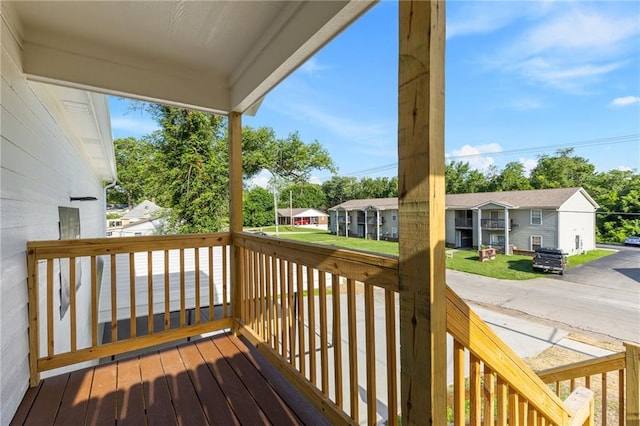 719 E Culton St, Warrensburg, MO 64093 - wooden deck with a residential view
