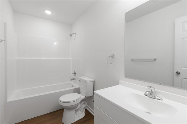 719 E Culton St, Warrensburg, MO 64093 - full bathroom featuring wood finished floors, vanity, and shower / bathtub combination