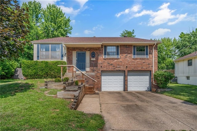 13011 S Raintree Dr, Olathe, KS 66062 - bi-level home featuring an attached garage, concrete driveway, a front lawn, and brick siding