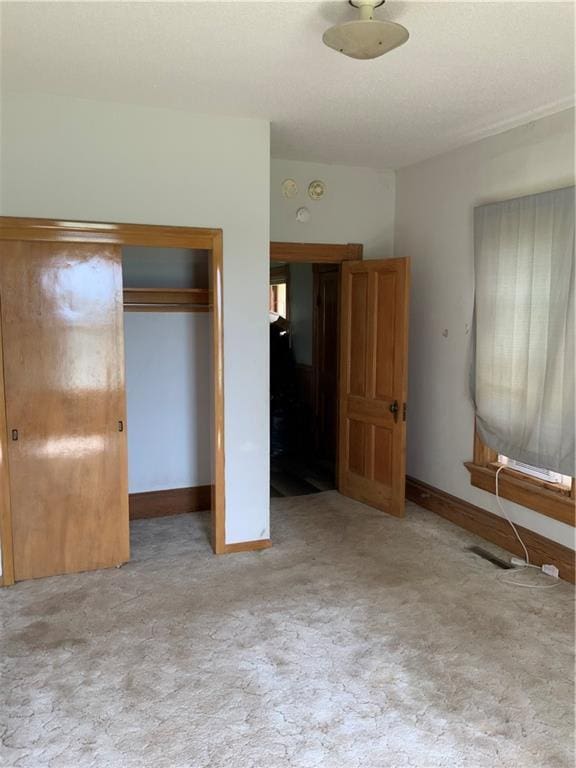 627 50th Rd, Toronto, KS 66777 - unfurnished bedroom featuring carpet floors and a closet