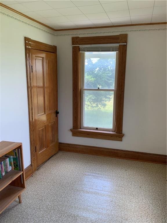 627 50th Rd, Toronto, KS 66777 - unfurnished room with baseboards and crown molding
