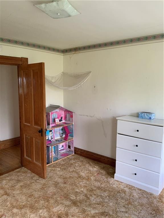 627 50th Rd, Toronto, KS 66777 - unfurnished bedroom with carpet and baseboards
