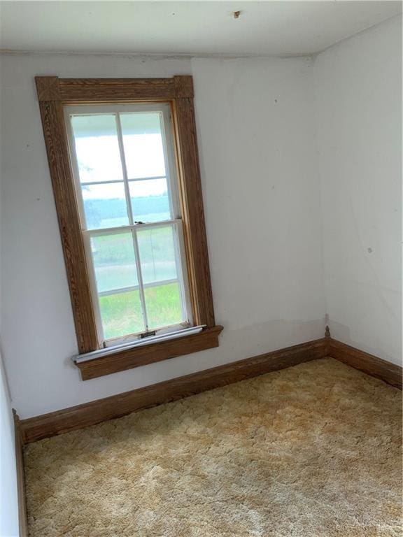 627 50th Rd, Toronto, KS 66777 - carpeted empty room with baseboards