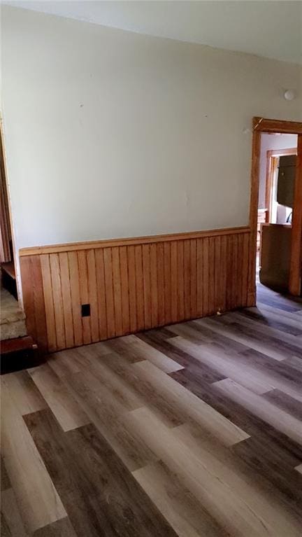 627 50th Rd, Toronto, KS 66777 - spare room with wainscoting and wood finished floors