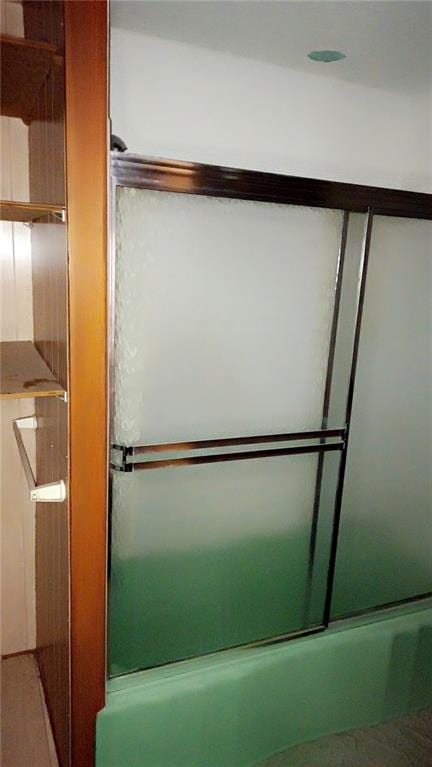 627 50th Rd, Toronto, KS 66777 - bathroom with shower / bath combination with glass door