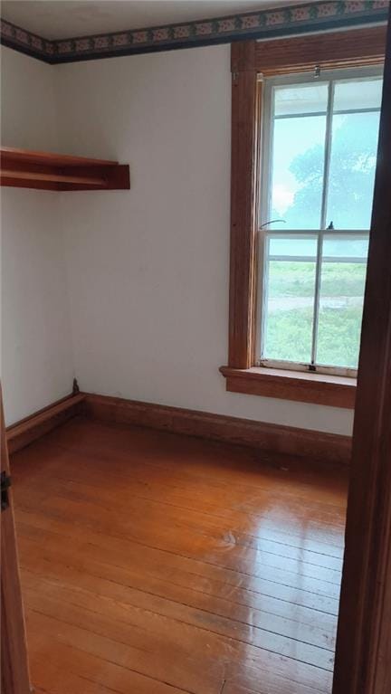 627 50th Rd, Toronto, KS 66777 - unfurnished room with healthy amount of natural light and light wood-style floors