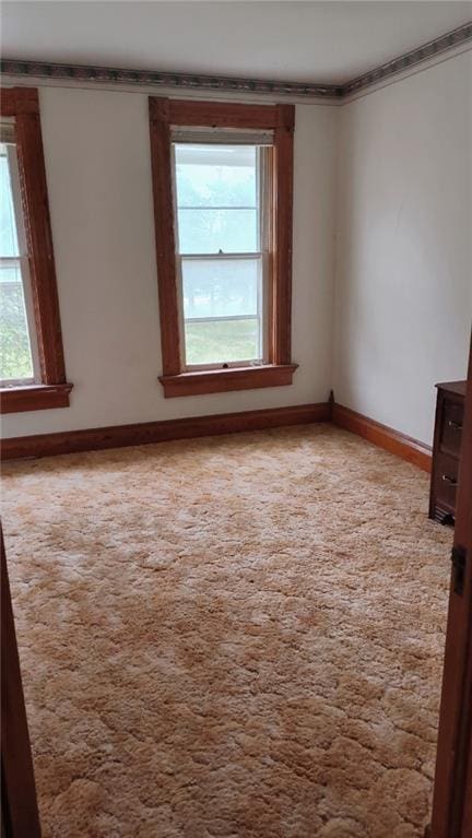 627 50th Rd, Toronto, KS 66777 - unfurnished room with carpet floors and crown molding