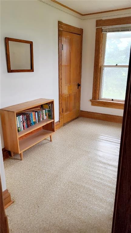 627 50th Rd, Toronto, KS 66777 - spare room featuring baseboards and ornamental molding