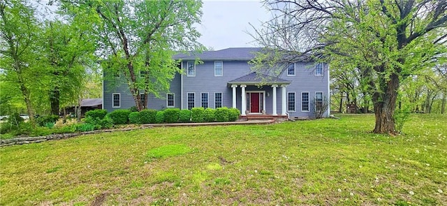789 Maple Rd, Uniontown, KS 66779 - colonial inspired home featuring a front yard