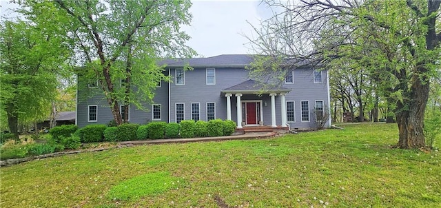 789 Maple Rd, Uniontown, KS 66779 - colonial home featuring a front yard