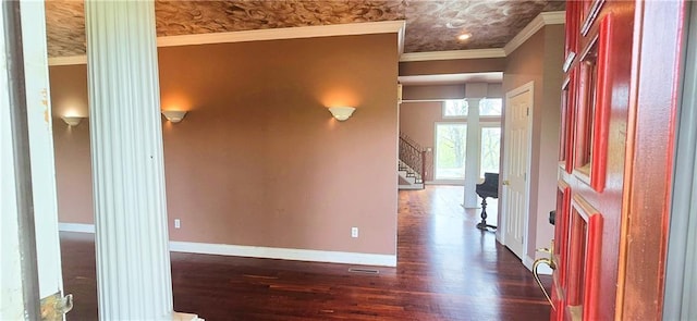 789 Maple Rd, Uniontown, KS 66779 - entryway featuring decorative columns, wood finished floors, ornamental molding, and stairs