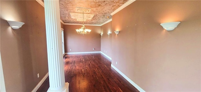 789 Maple Rd, Uniontown, KS 66779 - hall featuring ornamental molding, a chandelier, and wood finished floors