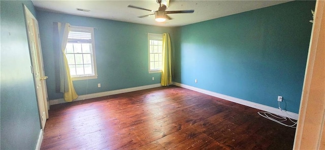 789 Maple Rd, Uniontown, KS 66779 - spare room featuring dark wood-type flooring and ceiling fan