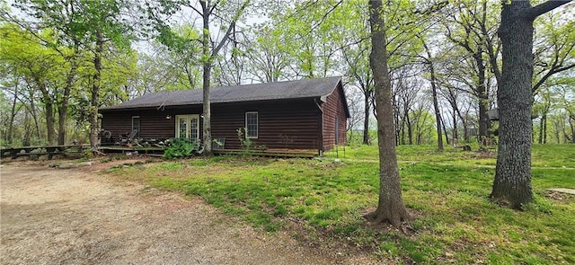 789 Maple Rd, Uniontown, KS 66779 - view of front facade featuring log veneer siding