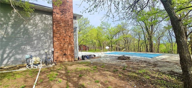 789 Maple Rd, Uniontown, KS 66779 - view of swimming pool featuring a covered pool