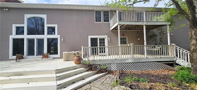 789 Maple Rd, Uniontown, KS 66779 - rear view of property featuring a balcony