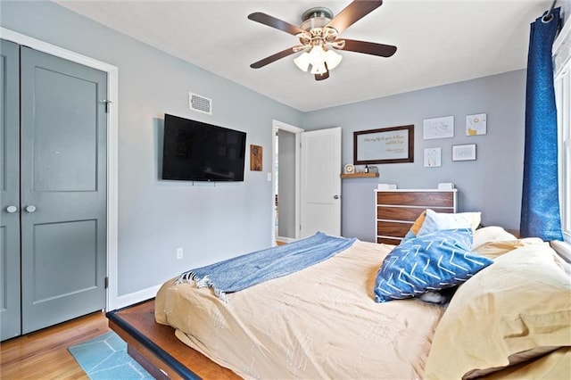 5001 W 70th St, Prairie Village, KS 66208 - bedroom with wood finished floors and ceiling fan