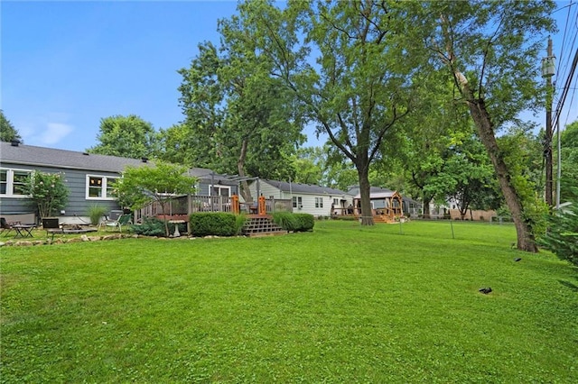 5001 W 70th St, Prairie Village, KS 66208 - view of green lawn featuring a wooden deck