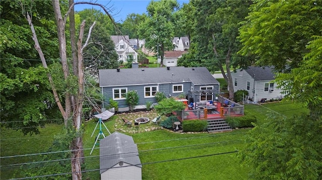 5001 W 70th St, Prairie Village, KS 66208 - back of property with a wooden deck and a yard