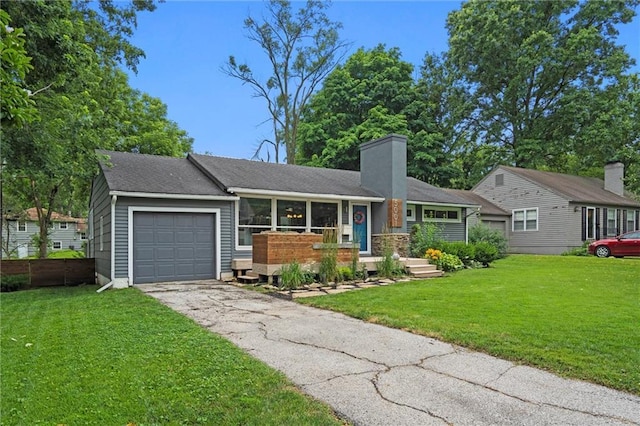 5001 W 70th St, Prairie Village, KS 66208 - view of front of house featuring an attached garage, a chimney, asphalt driveway, and a front lawn