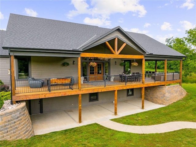 31788 W 223rd St, Spring Hill, KS 66083 - back of property featuring a patio, a shingled roof, a lawn, and a wooden deck