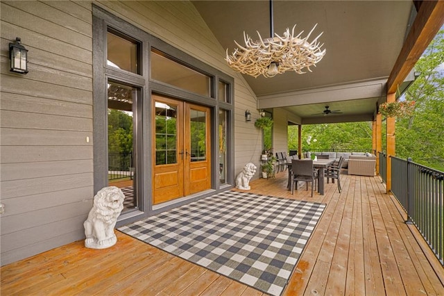 31788 W 223rd St, Spring Hill, KS 66083 - wooden deck with outdoor dining space, french doors, and a ceiling fan