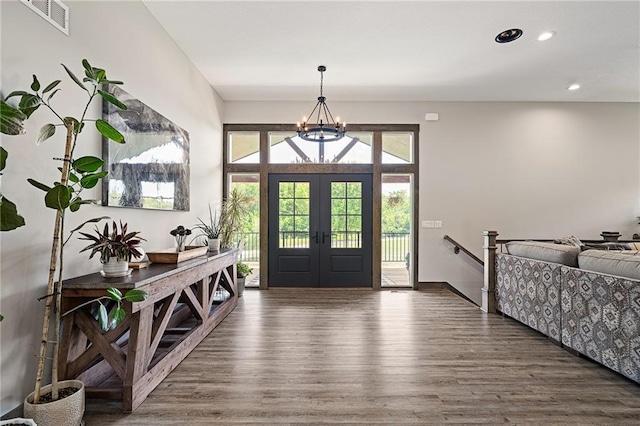 31788 W 223rd St, Spring Hill, KS 66083 - foyer featuring wood finished floors, a chandelier, french doors, and recessed lighting