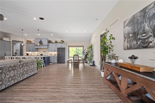 31788 W 223rd St, Spring Hill, KS 66083 - living area with light wood-style floors and recessed lighting