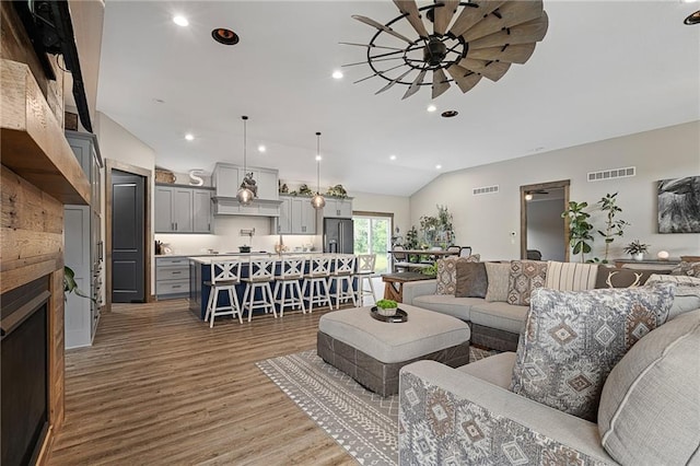 31788 W 223rd St, Spring Hill, KS 66083 - living room featuring light wood-style flooring, a ceiling fan, recessed lighting, and lofted ceiling