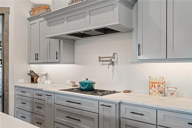 31788 W 223rd St, Spring Hill, KS 66083 - bar area featuring stainless steel gas cooktop and premium range hood