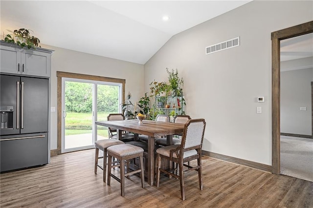 31788 W 223rd St, Spring Hill, KS 66083 - dining area with light wood finished floors, lofted ceiling, and recessed lighting