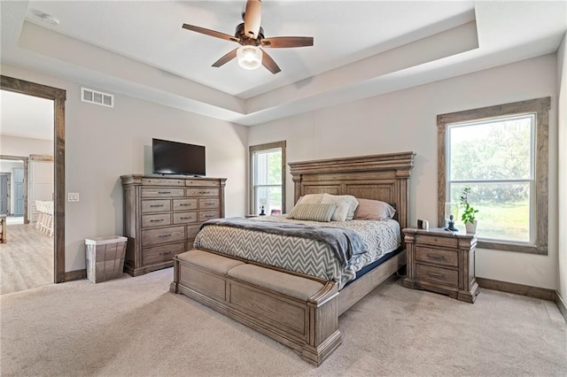 31788 W 223rd St, Spring Hill, KS 66083 - bedroom featuring light colored carpet, a raised ceiling, and a ceiling fan