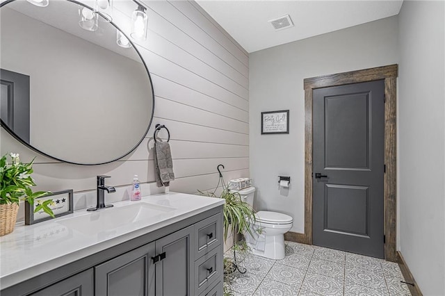 31788 W 223rd St, Spring Hill, KS 66083 - bathroom with vanity, wooden walls, and tile patterned flooring