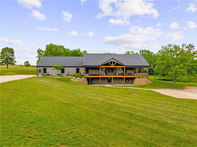 31788 W 223rd St, Spring Hill, KS 66083 - view of front of house featuring concrete driveway, a front yard, and a wooden deck