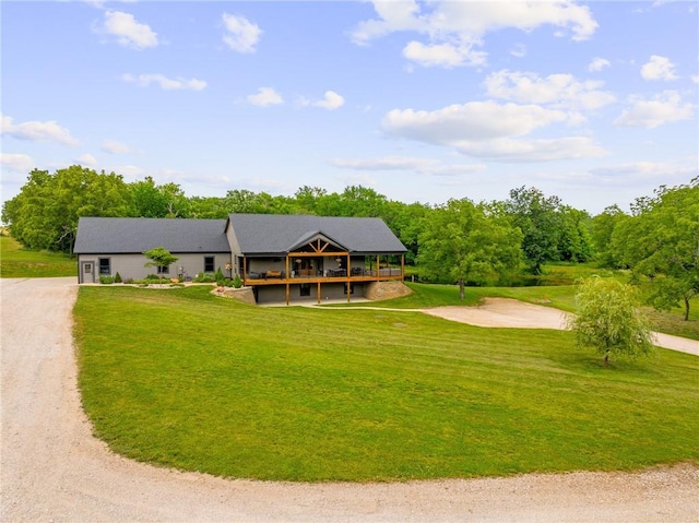 31788 W 223rd St, Spring Hill, KS 66083 - view of front facade featuring concrete driveway, a front yard, and a deck