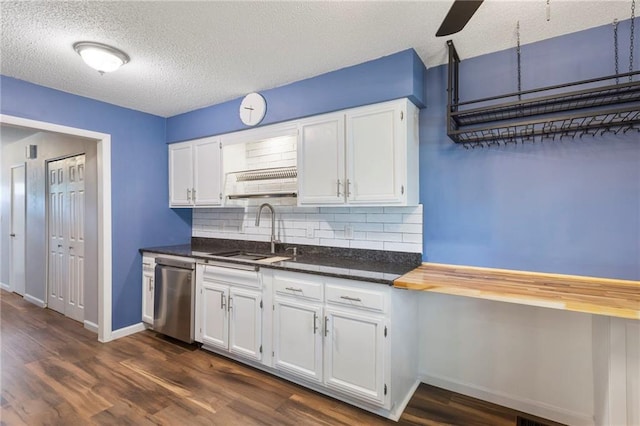 10017 W 95th St, Overland Park, KS 66212 - kitchen featuring dishwasher, decorative backsplash, white cabinets, and a textured ceiling