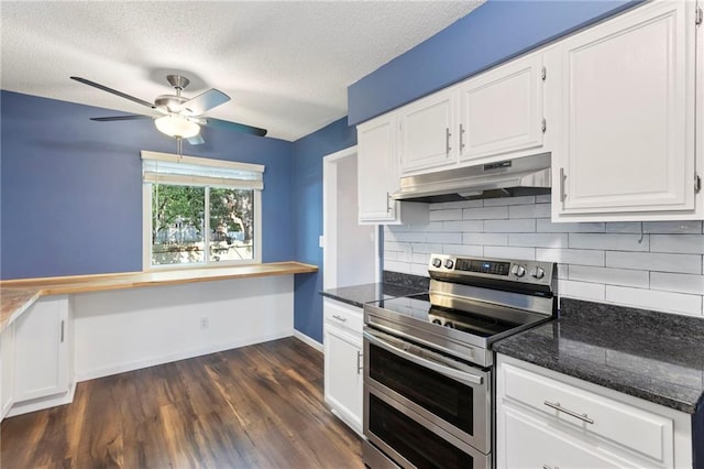 10017 W 95th St, Overland Park, KS 66212 - kitchen featuring range with two ovens, under cabinet range hood, built in desk, backsplash, and ceiling fan