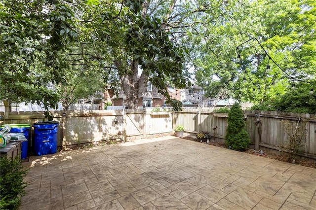 10017 W 95th St, Overland Park, KS 66212 - fenced backyard with a patio area