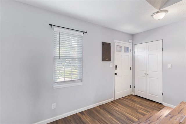10017 W 95th St, Overland Park, KS 66212 - entrance foyer featuring dark wood-style floors and baseboards