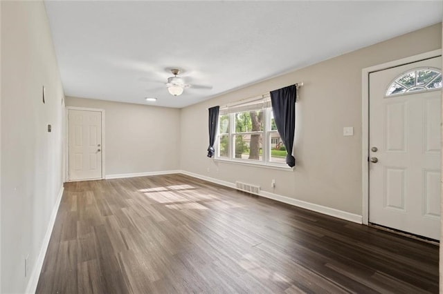 8710 Craig Dr, Overland Park, KS 66212 - entrance foyer with wood finished floors and a ceiling fan