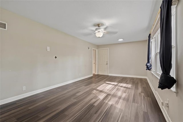 8710 Craig Dr, Overland Park, KS 66212 - spare room featuring wood finished floors and a ceiling fan