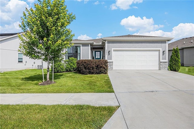 20854 W 190th Pl, Spring Hill, KS 66083 - view of front facade featuring an attached garage, concrete driveway, a front lawn, stone siding, and stucco siding