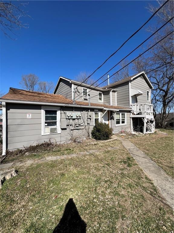 11300 E 29th St, Independence, MO 64052 - view of side of home with a yard