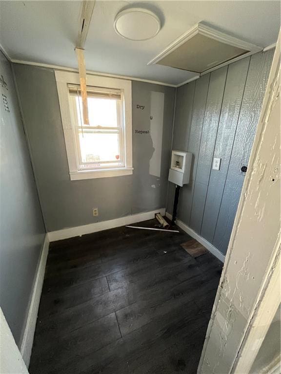 11300 E 29th St, Independence, MO 64052 - unfurnished bedroom with dark wood-type flooring and baseboards