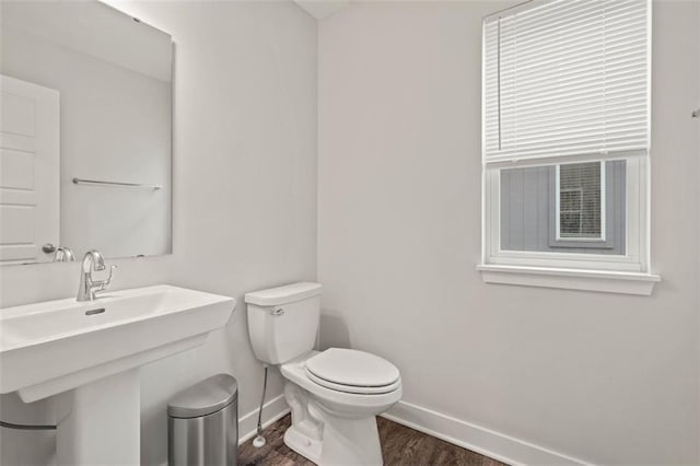 13333 W 180th St, Overland Park, KS 66013 - bathroom featuring baseboards and wood finished floors