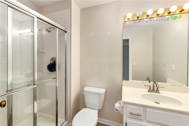 14010 Ash St, Overland Park, KS 66224 - full bathroom with a shower stall, vanity, and a textured ceiling