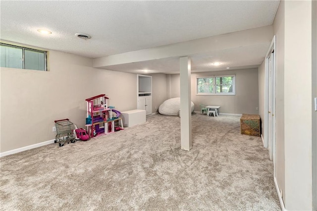 14010 Ash St, Overland Park, KS 66224 - below grade area with carpet and a textured ceiling