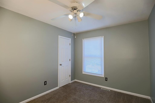 311 NE Bridge Pl, Blue Springs, MO 64014 - unfurnished room with dark carpet and a ceiling fan